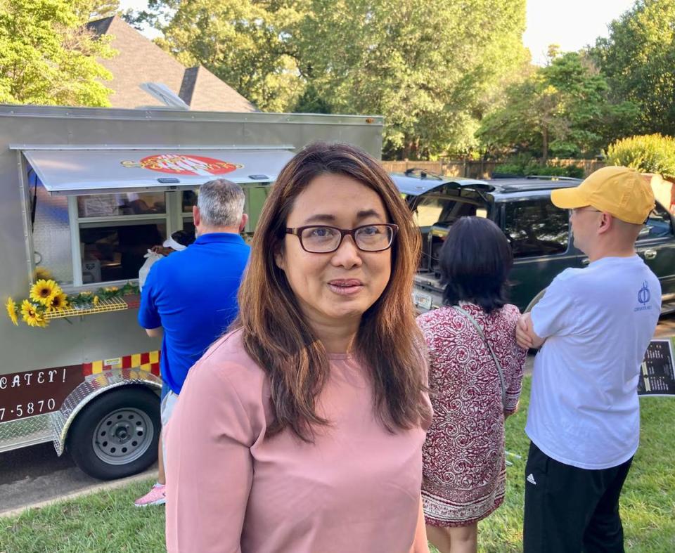Claire Reynes talks about the benefits of a food truck event in her subdivision.