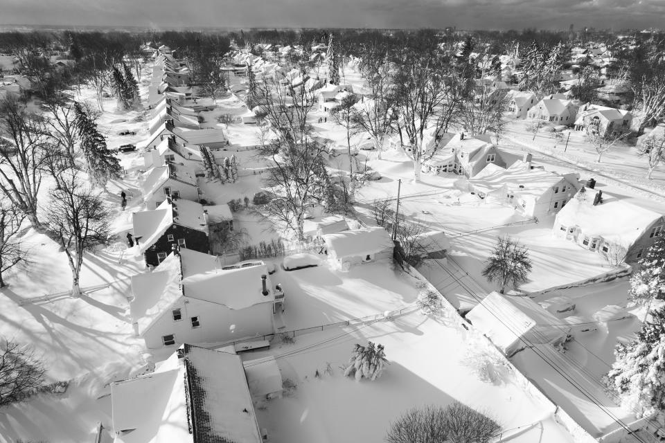 Snow blankets a neighborhood in Cheektowaga, N.Y.