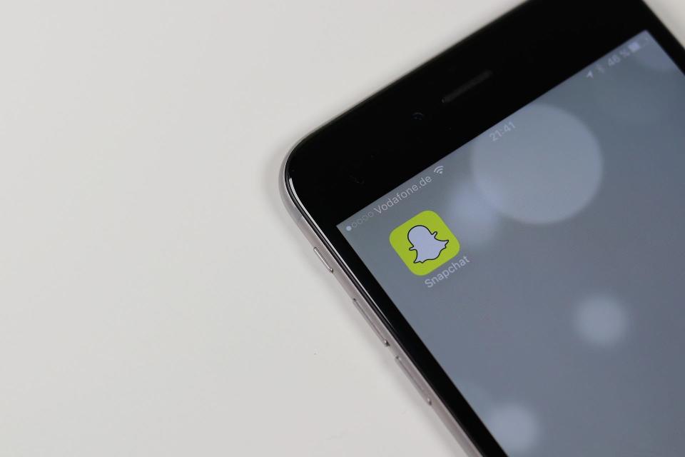 A stock image of the SnapChat app on a phone.