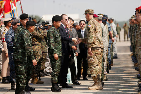 Ambassador Glyn T. Davies (C) shakes hand to soldiers during opening ceremony of Cobra Gold, Asia's largest annual multilateral military exercise, outside Bangkok, Thailand February 13, 2018. REUTERS/Soe Zeya Tun