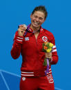 LONDON, ENGLAND - SEPTEMBER 01: Valerie Grand-Maison of Canada is presented with her silver medal that she won in the Women's 50m Freestyle on day three of the London 2012 Paralympic Games at the Aquatics Centre on September 01, 2012 in London, England. (Photo by Ian MacNicol/Getty Images)