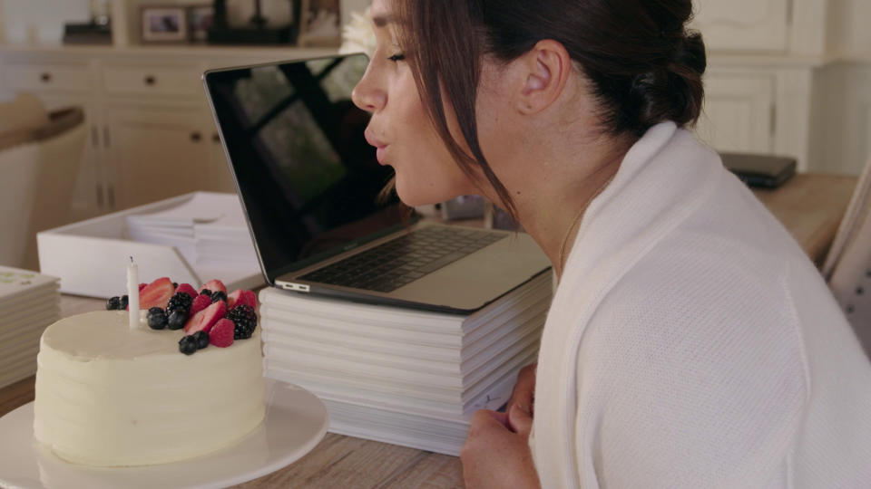 Meghan Markle blowing out birthday cake candles