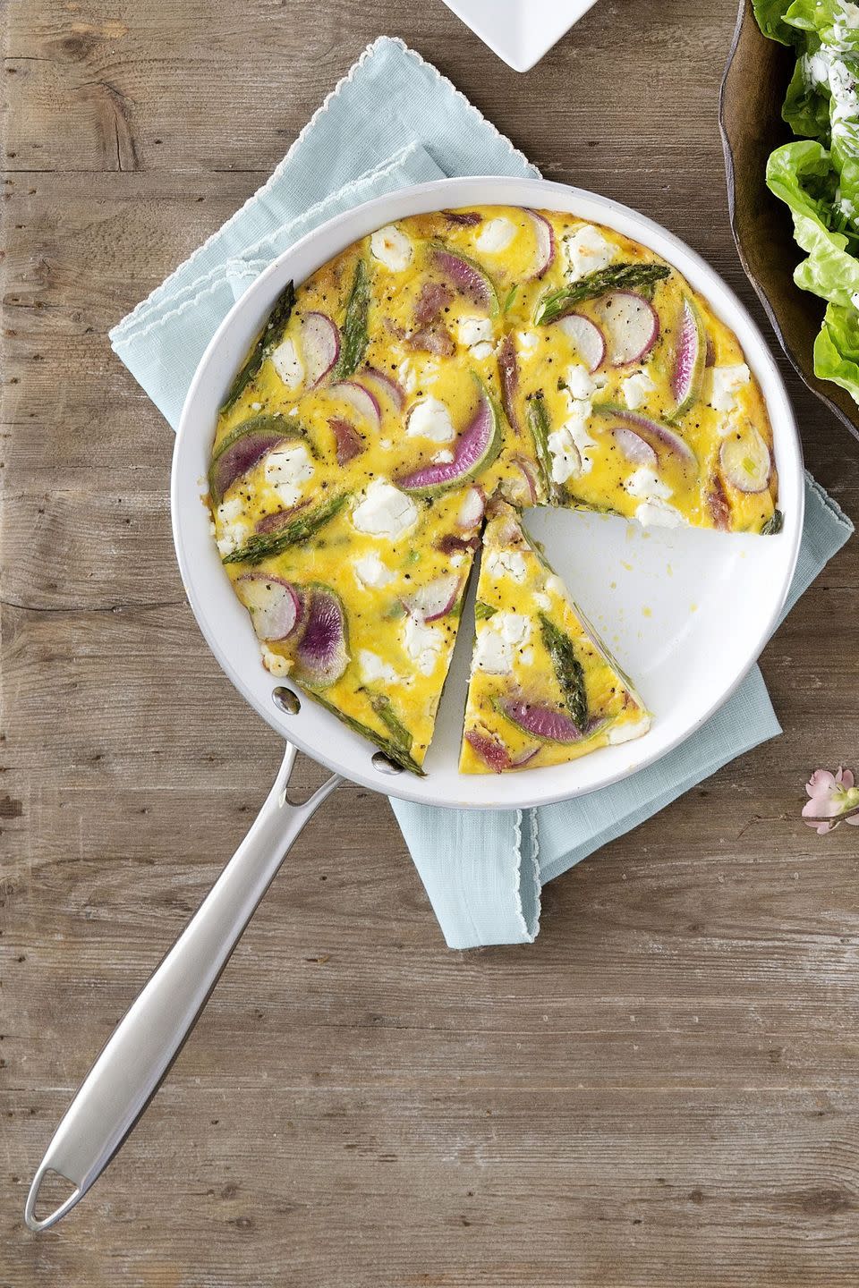 <p>This brunch-ready dish can easily feed a crowd.</p><p><strong><a href="https://www.countryliving.com/food-drinks/recipes/a35032/spring-vegetable-ham-and-goat-cheese-frittata/" rel="nofollow noopener" target="_blank" data-ylk="slk:Get the recipe for Spring Vegetable, Ham, and Goat Cheese Frittata;elm:context_link;itc:0;sec:content-canvas" class="link ">Get the recipe for Spring Vegetable, Ham, and Goat Cheese Frittata</a>.</strong></p>