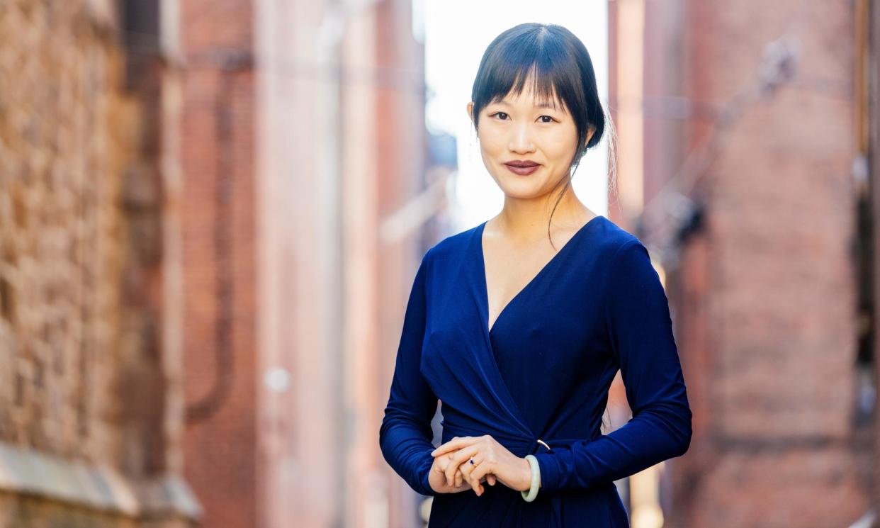 <span>‘The role of the novelist is to imagine’: Rebecca F Kuang photographed in Boston, Massachusetts.</span><span>Photograph: M Scott Brauer/The Guardian</span>