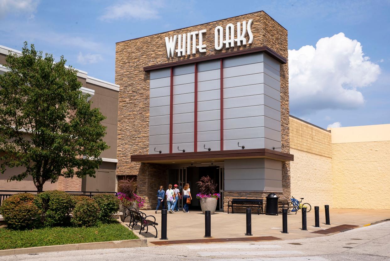 People enter through the main entrance of White Oaks Mall on Thursday, Aug. 5, 2021, in Springfield. The mall has been home to District 186's Lawrence Education Center which will be closing in May 2024.