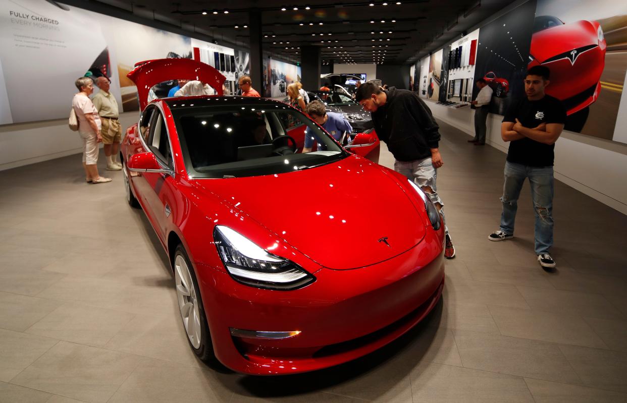 A Tesla is seen on display in 2018 in Denver. A Tesla sales gallery has now been approved in Portsmouth, New Hampshire.