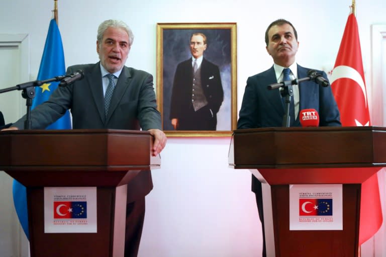 European Commissioner for Humanitarian Aid and Crisis Management Christos Stylianides (L) delivers a speech next to Turkey’s EU Minister Omer Celik (R) during a joint press conference following their meeting on September 26, 2016