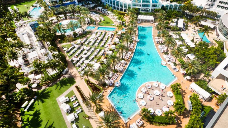 Guests of Fontainebleau Miami Beach can be enticed to sunbathe and sip cocktails by the variety of modern pools spread around the luxury resort. 