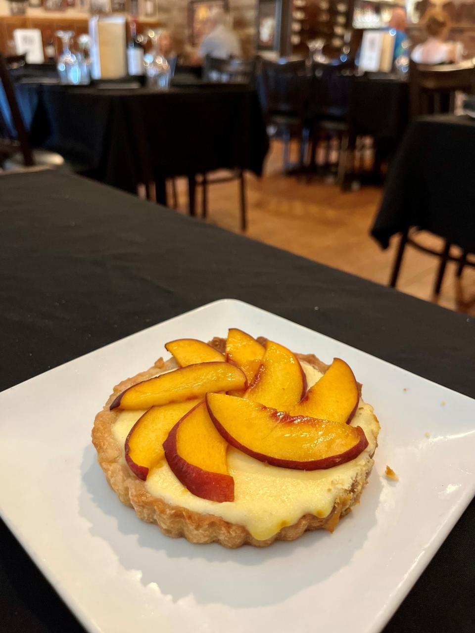Owner Melissa Fleming makes the desserts, including this ricotta peach tart, at Trattoria Ciao.