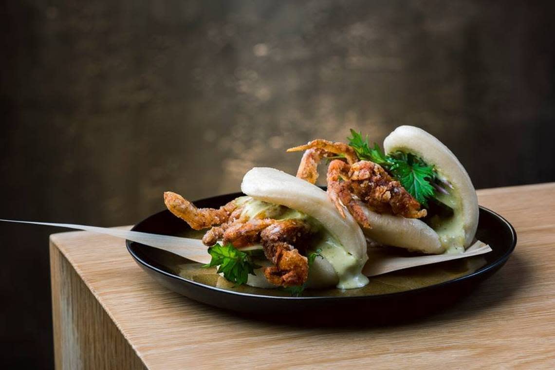 Kyu’s soft shell crab buns are among the restaurant’s most popular dishes.