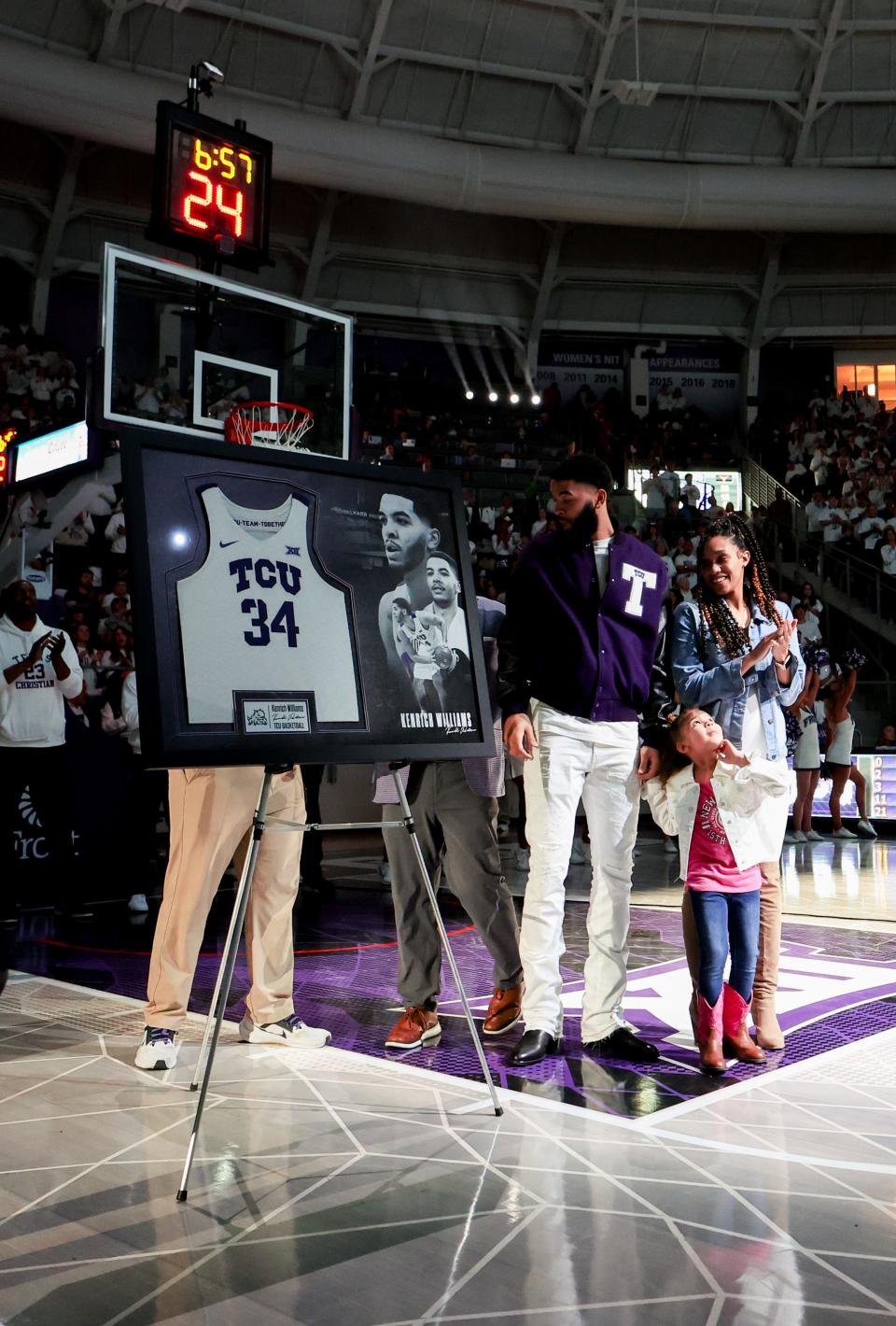 The jersey of Thunder forward and former TCU standout Kenrich Williams is retired at halftime during the Horned Frogs' game against Texas on Saturday at Ed and Rae Schollmaier Arena in Fort Worth, Texas.