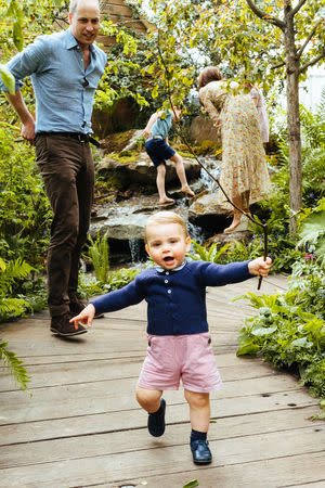 Britain's Prince William and Catherine, Duchess of Cambridge with Prince George, Princess Charlotte and Prince Louis explore the Adam White and Andree Davies co-designed garden ahead of the RHS Chelsea Flower Show in London, Britain. May 19, 2019. Picture taken May 19, 2019. Matt Porteous/PA Wire/Handout via REUTERS