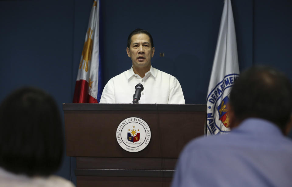 Philippine Foreign Affairs Department spokesman Raul Hernandez answers questions from reporters during a press conference at Foreign Affairs headquarters in suburban Pasay, south of Manila, Philippines on Tuesday, Feb. 25, 2014. The Philippines has called in a Chinese envoy to protest what it says was the firing of a water cannon by a Chinese government vessel on Filipino fishermen in a disputed shoal in the South China Sea. (AP Photo/Aaron Favila)