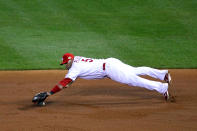 ST LOUIS, MO - OCTOBER 27: Albert Pujols #5 of the St. Louis Cardinals dives for a single hit by Josh Hamilton #32 of the Texas Rangers in the sixth inning during Game Six of the MLB World Series at Busch Stadium on October 27, 2011 in St Louis, Missouri. (Photo by Dilip Vishwanat/Getty Images)