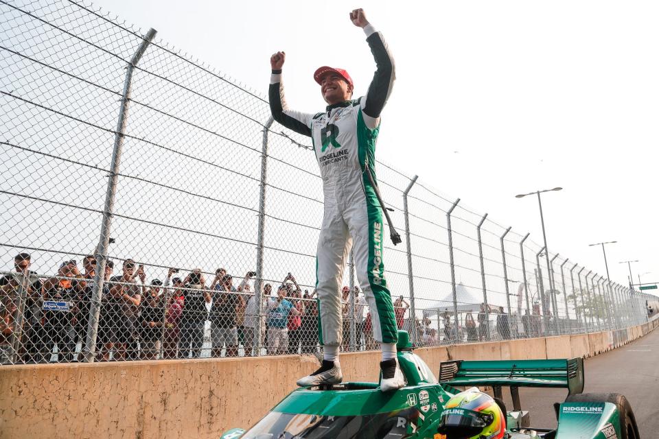 IndyCar driver Alex Palou celebrates winning the Detroit Grand Prix in Detroit on Sunday, June 4, 2023.