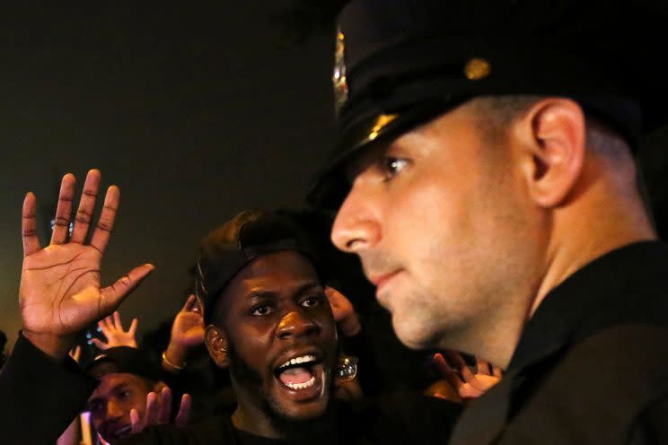 A protester confronts a New York City police officer during a march against police brutality in Manhattan, July 9, 2016. (Photo: Bria Webb/Reuters)