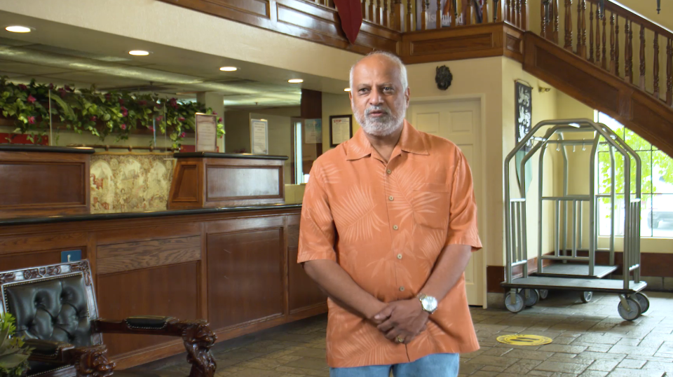 Bharat Patel discusses his empty hotel, crushing bills, and the sadness of letting longtime employees go. Interview photo.