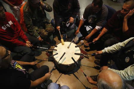 Native American drummers takes part in a "victory pow wow" to celebrate with activists and veterans who had spent time in the Oceti Sakowin camp at the Prairie Knights Casino in the Standing Rock Indian Reservation, near Fort Yates, North Dakota, U.S., December 6, 2016. REUTERS/Lucas Jackson