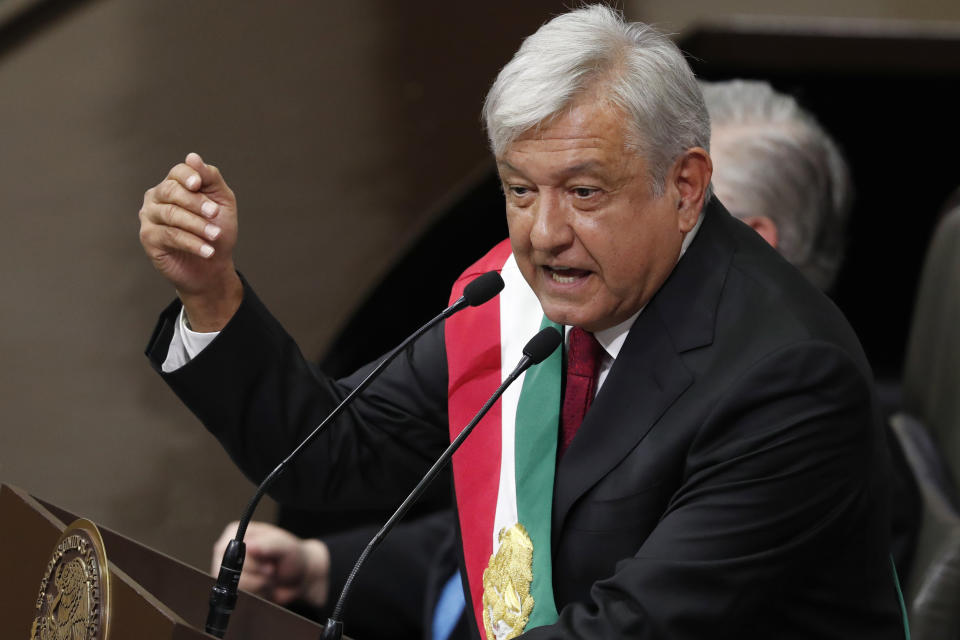Mexico's newly sworn-in President Andres Manuel Lopez Obrador delivers his inaugural speech at the National Congress, in Mexico City, Saturday, Dec. 1, 2018. Lopez Obrador pledged "a peaceful and orderly transition, but one that is deep and radical ... because we will end the corruption and impunity that prevent Mexico's rebirth." (AP Photo/Marco Ugarte)
