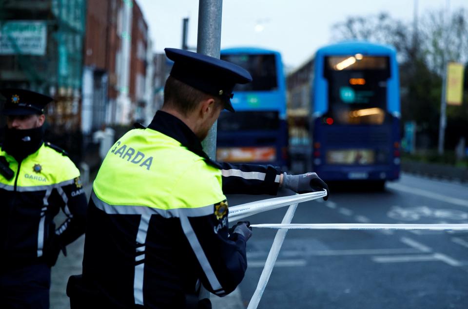 Police officers work near the scene of a suspected stabbing (REUTERS)