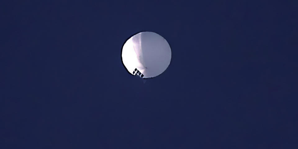 A high altitude balloon floats over Billings, Mont., on Wednesday, Feb. 1, 2023. The U.S. is tracking a suspected Chinese surveillance balloon that has been spotted over U.S. airspace for a couple days, but the Pentagon decided not to shoot it down due to risks of harm for people on the ground, officials said Thursday, Feb. 2, 2023. The Pentagon would not confirm that the balloon in the photo was the surveillance balloon. (Larry Mayer/The Billings Gazette via AP) (Larry Mayer / The Billings Gazette via AP)