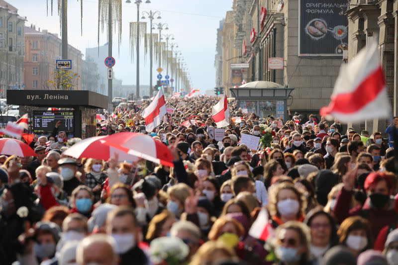 Belarusian opposition supporters hold a rally in Minsk