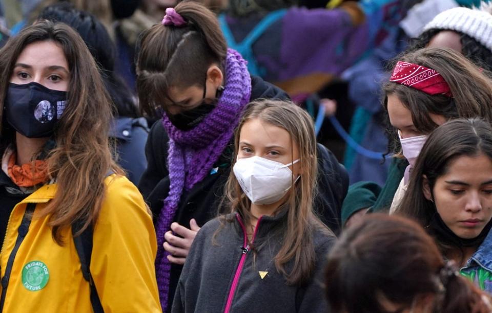 Greta Thunberg (centre) along with demonstrators during the Fridays for Future Scotland march (Andrew Milligan/PA) (PA Wire)