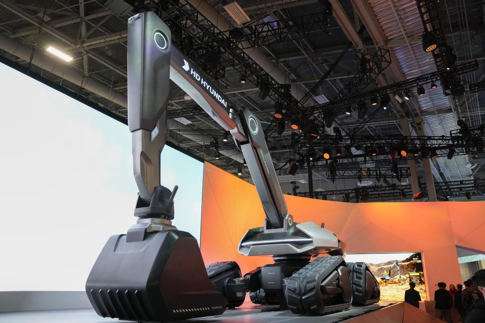 A concept of a fully electronic autonomous excavator, themed as Xite Innovation, is displayed at the HD Hyundai booth during the CES tech show Tuesday, Jan. 9, 2024, in Las Vegas. (AP Photo/Ryan Sun)