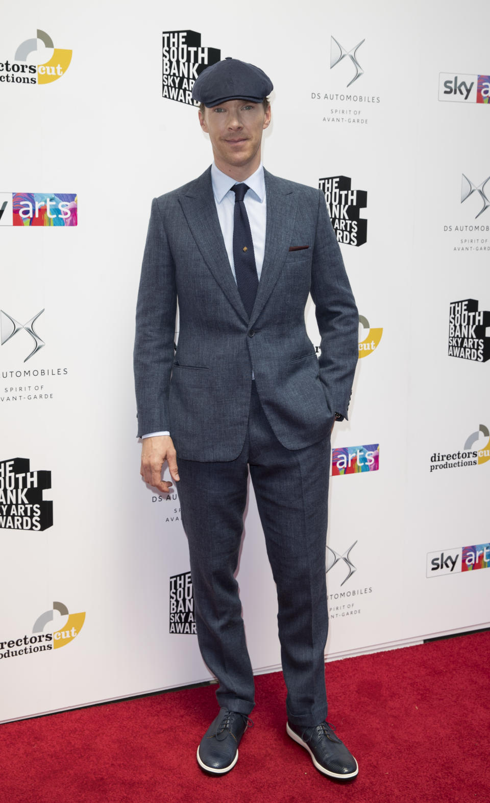 <p>Benedict Cumberbatch dressed the part for The Southbank Sky Awards on 1 July in a two-piece suit and flat cap. <em>[Photo: Getty]</em> </p>