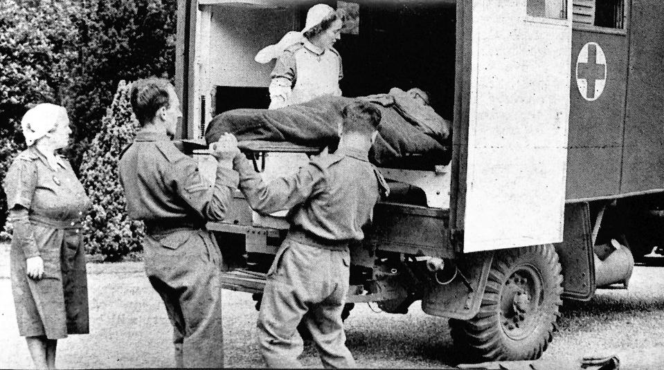 British Red Cross volunteers unloading an ambulance in the UK, following D-Day, in June 1944 (British Red Cross/PA)