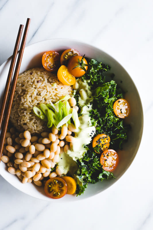 <p>Parsley Vegan</p><p>This recipe for green Thai curry brown rice bowls is a mix of beans, kale, rice and green curry—all in an explosion of delicious Thai flavors.</p><p><strong>Get the recipe: <a href="http://www.parsleyvegan.com/green-thai-curry-brown-rice-bowl/" rel="nofollow noopener" target="_blank" data-ylk="slk:Green Thai Curry Brown Rice Bowls;elm:context_link;itc:0;sec:content-canvas" class="link rapid-noclick-resp">Green Thai Curry Brown Rice Bowls</a></strong></p>