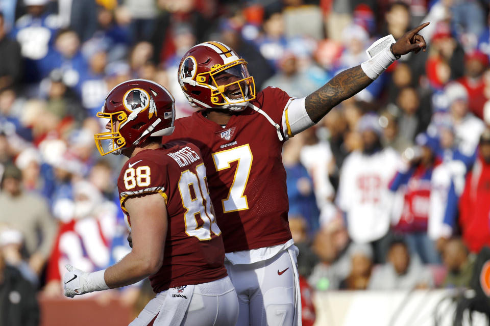 Washington Redskins quarterback Dwayne Haskins (7) and tight end Hale Hentges (88) celebrate after they connected for a touchdown pass and catch against the Washington Redskins during the first half of an NFL football game, Sunday, Dec. 22, 2019, in Landover, Md. (AP Photo/Patrick Semansky)