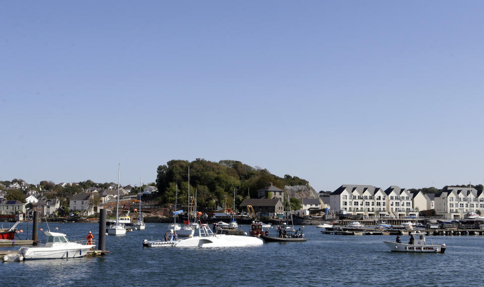 The Mayflower Autonomous Ship is towed to its berth after being launched for it's first outing on water since being built in Turnchapel, Plymouth south west England, Monday, Sept. 14, 2020. The autonomous ship aims to cross the Atlantic from Plymouth, England, to Plymouth, Ma, USA, in April 2021, to become be the first totally autonomous ship to cross the ocean without any help from the outside. (AP Photo/Alastair Grant)