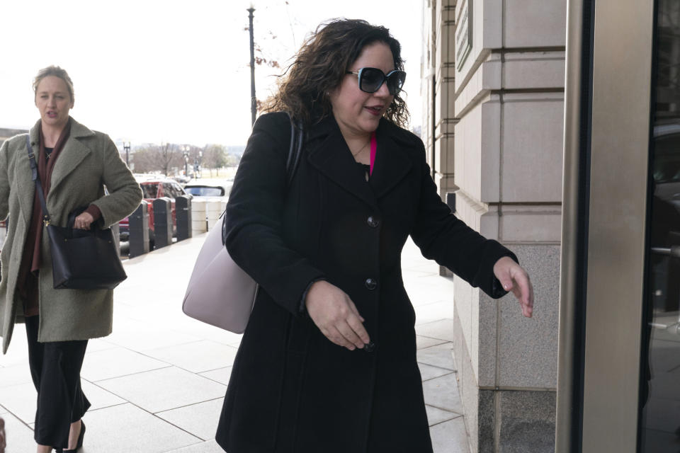 Sandra Garza, longtime partner of fallen U.S. Capitol Police officer Brian Sicknick, arrives for the sentencing hearing for Julian Khater and George Tanios, at the federal courthouse in Washington, Friday, Jan. 27, 2023. Khater, who admitted to assaulting officer Sicknick with chemical spray on Jan 6, 2021, before he collapsed and died, is scheduled to be sentenced today. A medical examiner concluded that Capitol Police Officer Brian Sicknick, 42, suffered two strokes and died of natural causes a day after he and other officers tried to hold off the mob that stormed the Capitol on Jan. 6, 2021. (AP Photo/Jose Luis Magana)