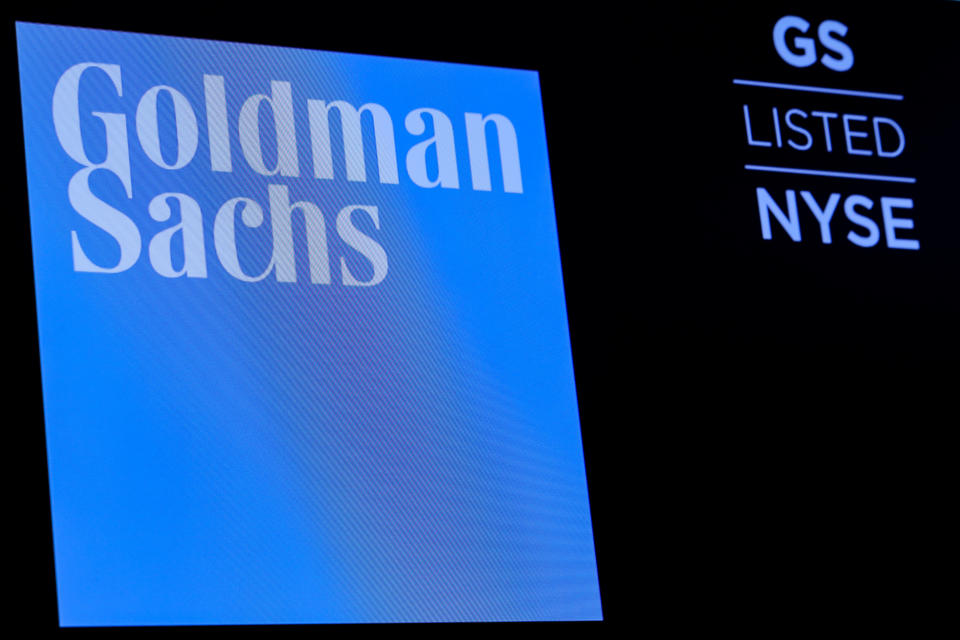 The ticker symbol and logo for Goldman Sachs is displayed on a screen on the floor at the New York Stock Exchange (NYSE) in New York, U.S., December 18, 2018. REUTERS/Brendan McDermid