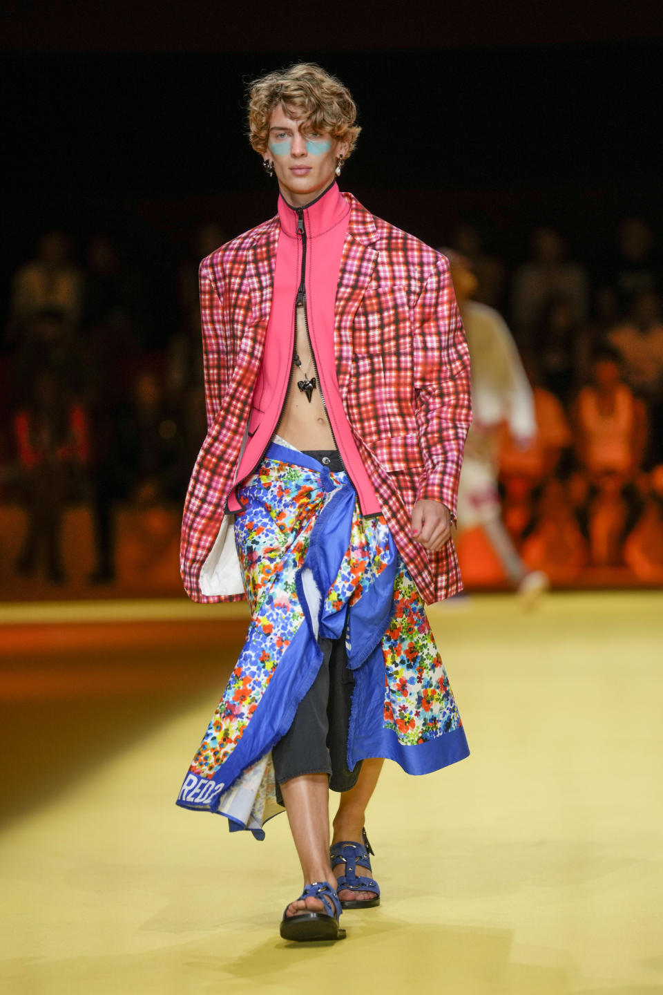 A model wears a creation as part of the Dsquared2 men's Spring Summer 2023 collection presented in Milan, Italy, Friday, June 17, 2022. (AP Photo/Luca Bruno)