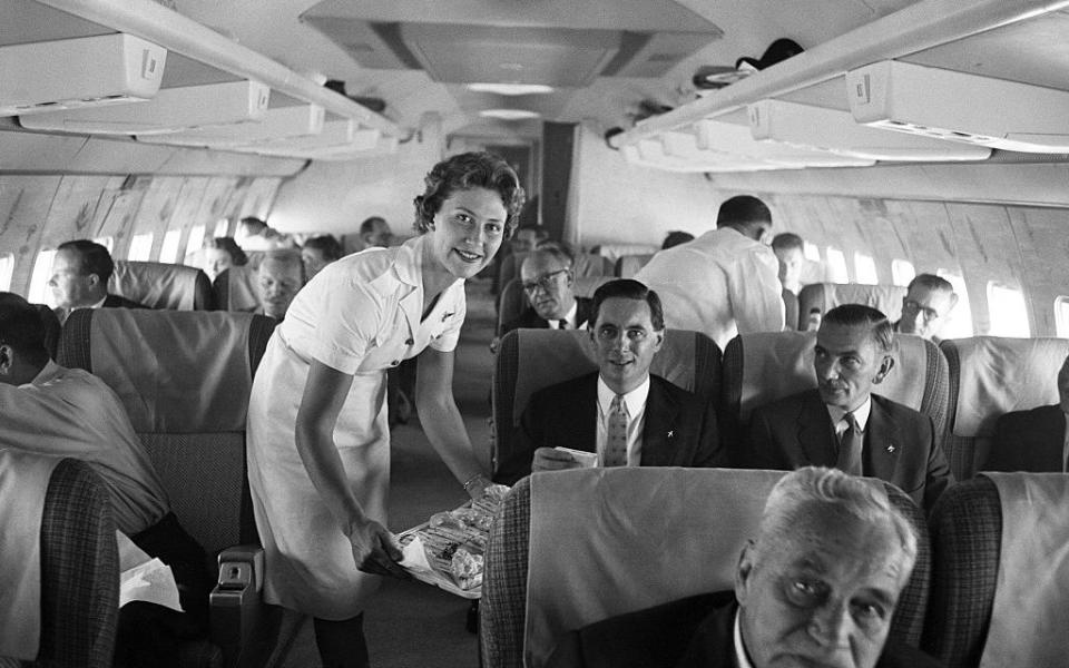 On board a Qantas Boeing 707 plane in 1959 - Getty