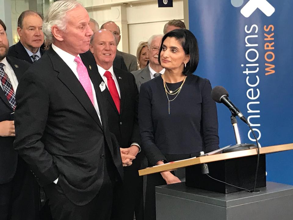 In this 2019 file photo, Gov. Henry McMaster thanks Centers for Medicare & Medicaid Administrator Seema Verna, right, for approving waivers that will allow South Carolina to impose work requirements on Medicaid recipients.