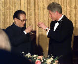 FILE - Then U.S. President Bill Clinton, right, and Chinese President Jiang Zemin toast during their state dinner at the White House, Oct. 29, 1997. Chinese state TV said Wednesday, Nov. 30, 2022, that Jiang has died at age 96. (AP Photo/Greg Gibson, File)