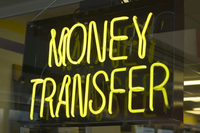 Image © Tillsonburg / Getty Images Stock image of a money transfer sign