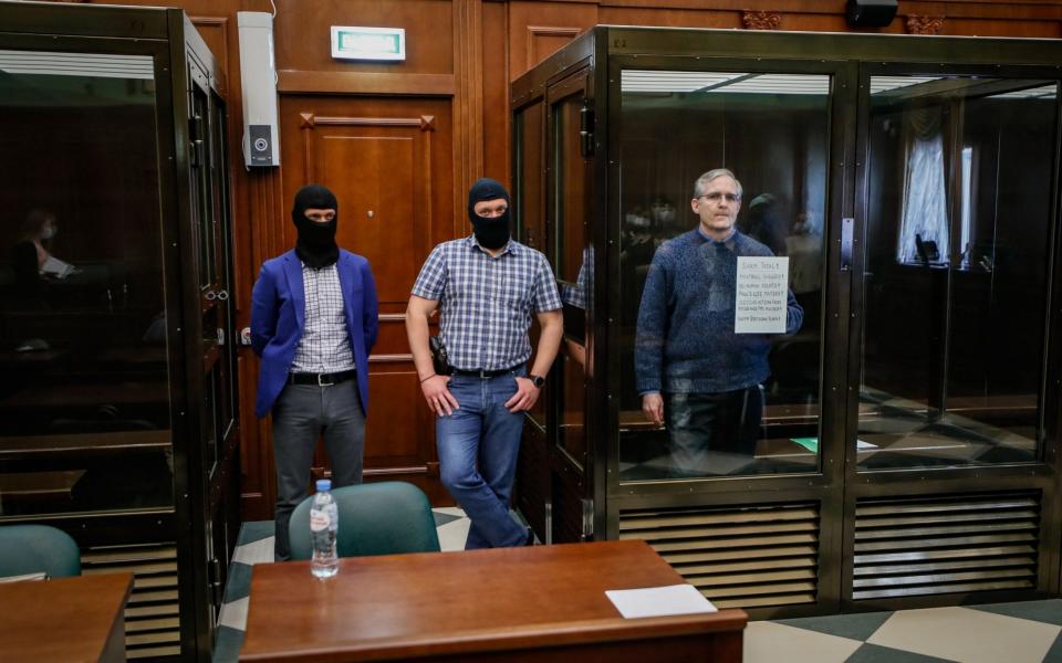 Paul Whelan, right, stands in a Moscow courtroom awaiting verdict - Yuri Kochetkov/EPA-EFE