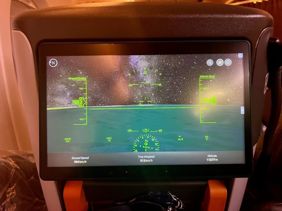 The premium economy screen showing the altitude, heading, and speed of Singapore's A380 enroute.