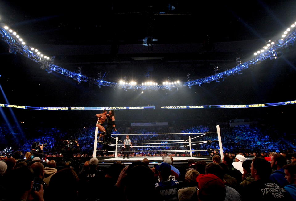 WWE wrestlers Alberto Del Rio (L) and Roman Reigns participate during the WWE Survivor Series, a professional wrestling event at Philips Arena in Atlanta, Georgia November 22, 2015. The Federal Bureau of Investigation said on Saturday (November 21) it did not view a reported threat by Islamic State militants to attack a professional wrestling event in Atlanta this weekend as credible.  REUTERS/Tami Chappell  