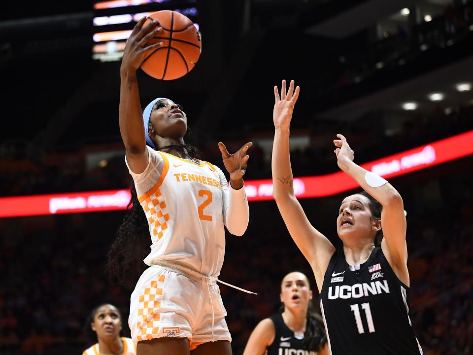 Tennessee's Rickea Jackson (2) gets a basket while guarded by UConn's Lou Lopez Sénéchal (11) during the NCAA college basketball game between the Tennessee Lady Vols and Connecticut Huskies in Knoxville, Tenn. on Thursday, January 26, 2023. 