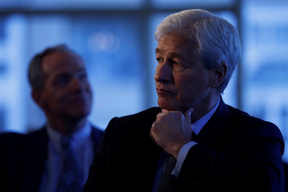 JP Morgan CEO Jamie Dimon listens as he is introduced at the Boston College Chief Executives Club luncheon in Boston, Massachusetts, U.S., November 23, 2021.    REUTERS/Brian Snyder
