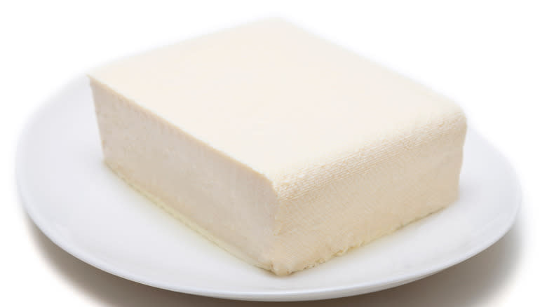 Block of tofu on plate