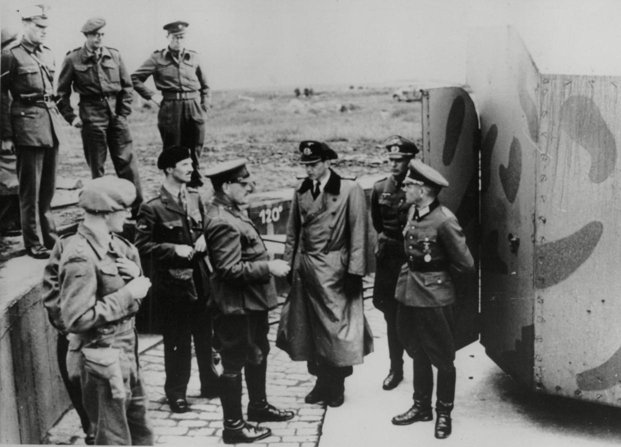 <span>Commandant Oberst Schwalm surrenders to Brigadier Alfred Ernest Snow on the Channel Island of Alderney on 16 May 1945.</span><span>Photograph: Northcliffe Collection/ANL/Shutterstock</span>