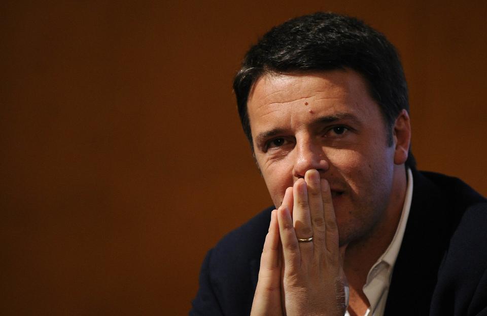 Florence mayor Matteo Renzi looks on during a political meeting in Turin