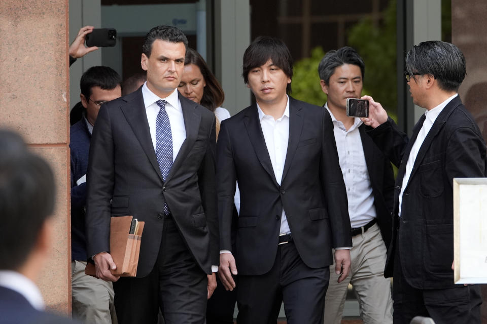 Ippei Mizuhara, the former longtime interpreter for the Los Angeles Dodgers baseball star Shohei Ohtani, leaves federal court following his arraignment, Tuesday, May 14, 2024 in Los Angeles. Mizuhara pleaded not guilty Tuesday to bank and tax fraud, a formality ahead of a plea deal he’s negotiated with federal prosecutors in a wide-ranging sports betting case. (AP Photo/Damian Dovarganes)