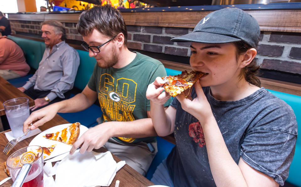 Mellow Mushroom Ocala’s first customers on grand opening day, Dec. 4, were Rodney Whitlock, left and Dahlia Cook, right.